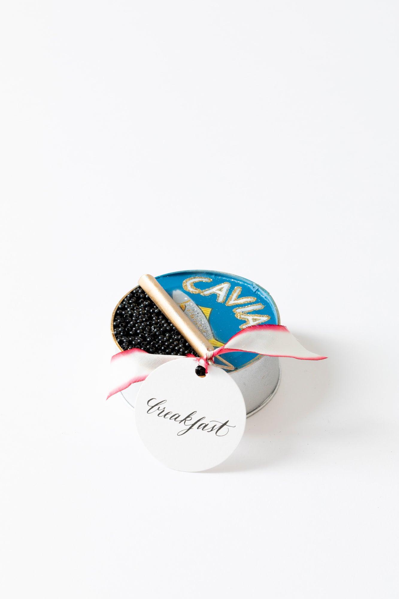 Hand-blown and hand-painted Caviar ornament crafted in Poland