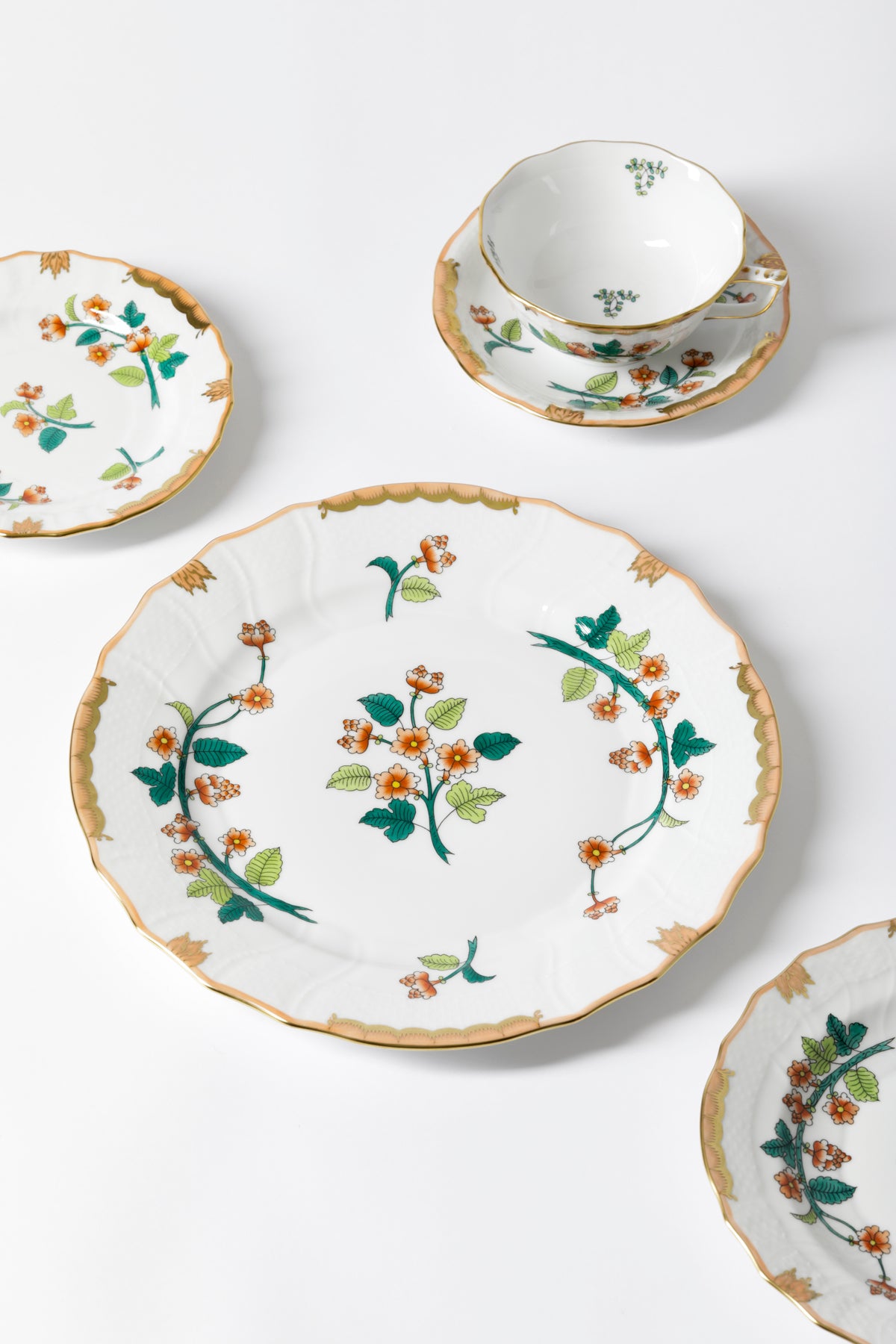 Handmade and handpainted porcelain from Hungary enhanced with 24k gold accents.
