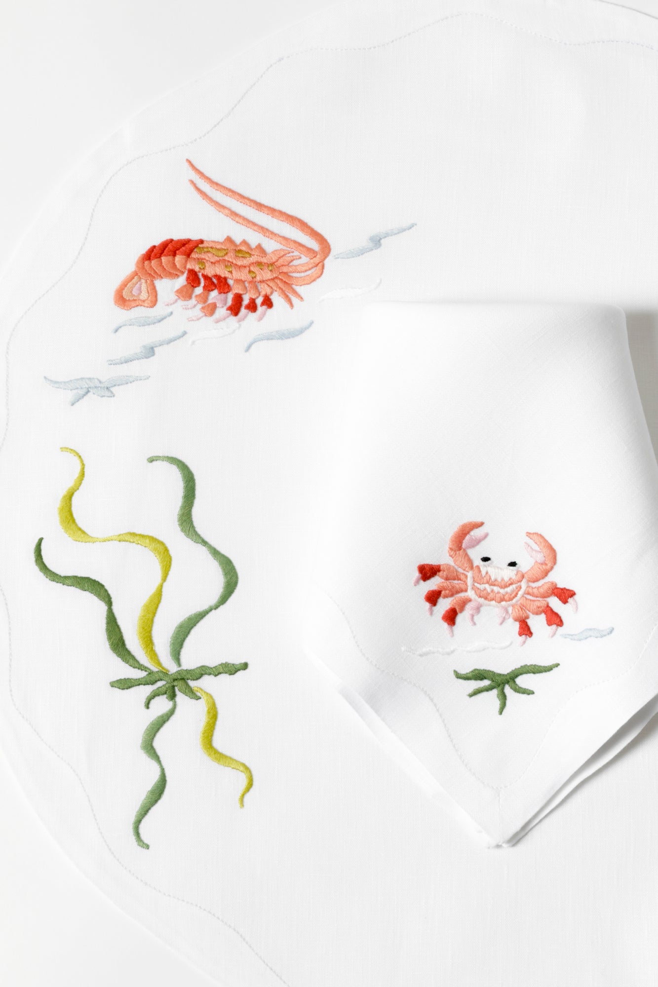 Dinner napkin linen with crustaceans stitched. Made in Madeira, Portugal.