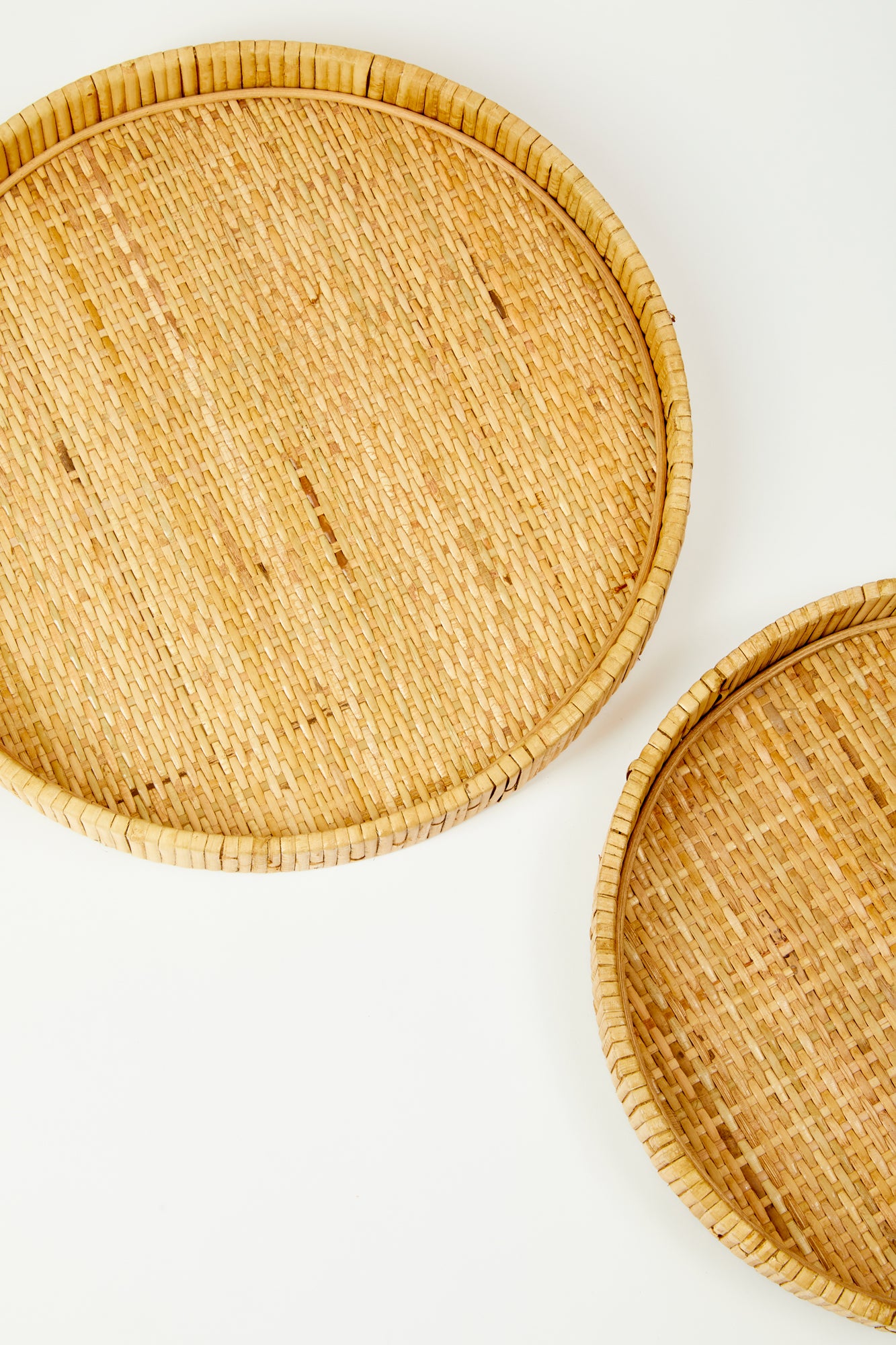 Round rattan passing tray.