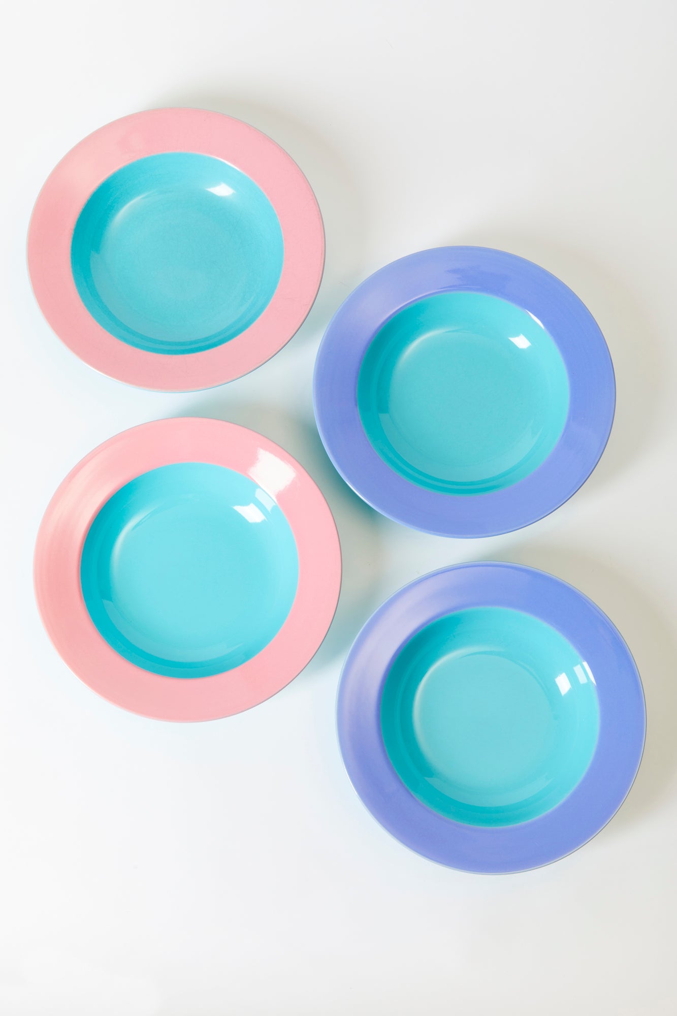 Two-tone dinnerware collection was designed in 1986, at the height of the Postmodern movement, led by the Memphis Group in Italy.