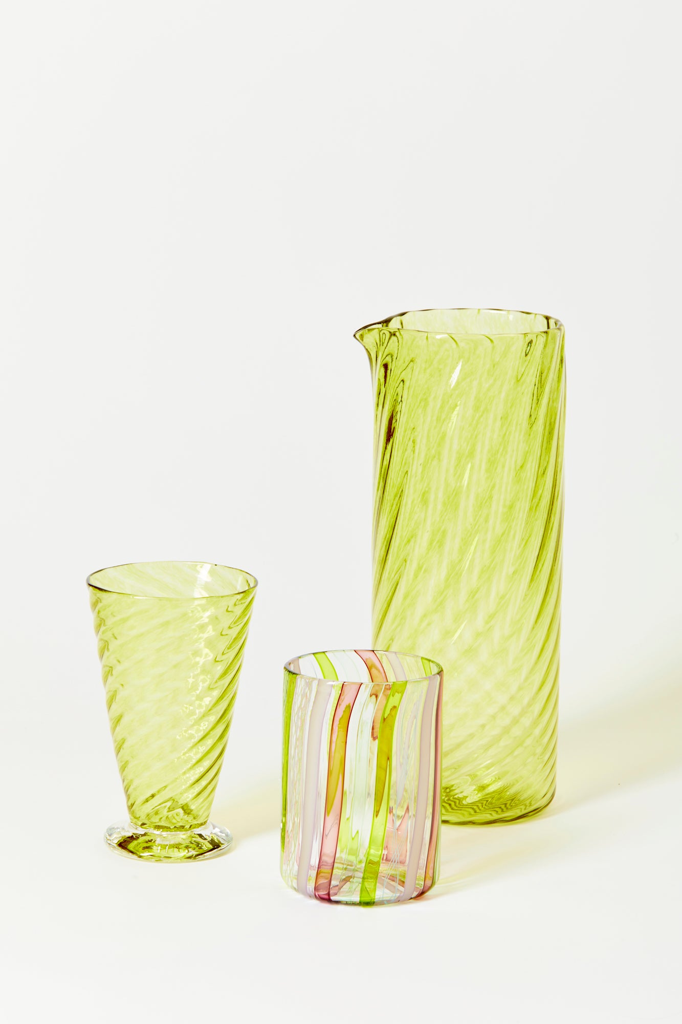 Hand-blown exclusively for Houses Parties using twisted glass canes by Tracy Glover.