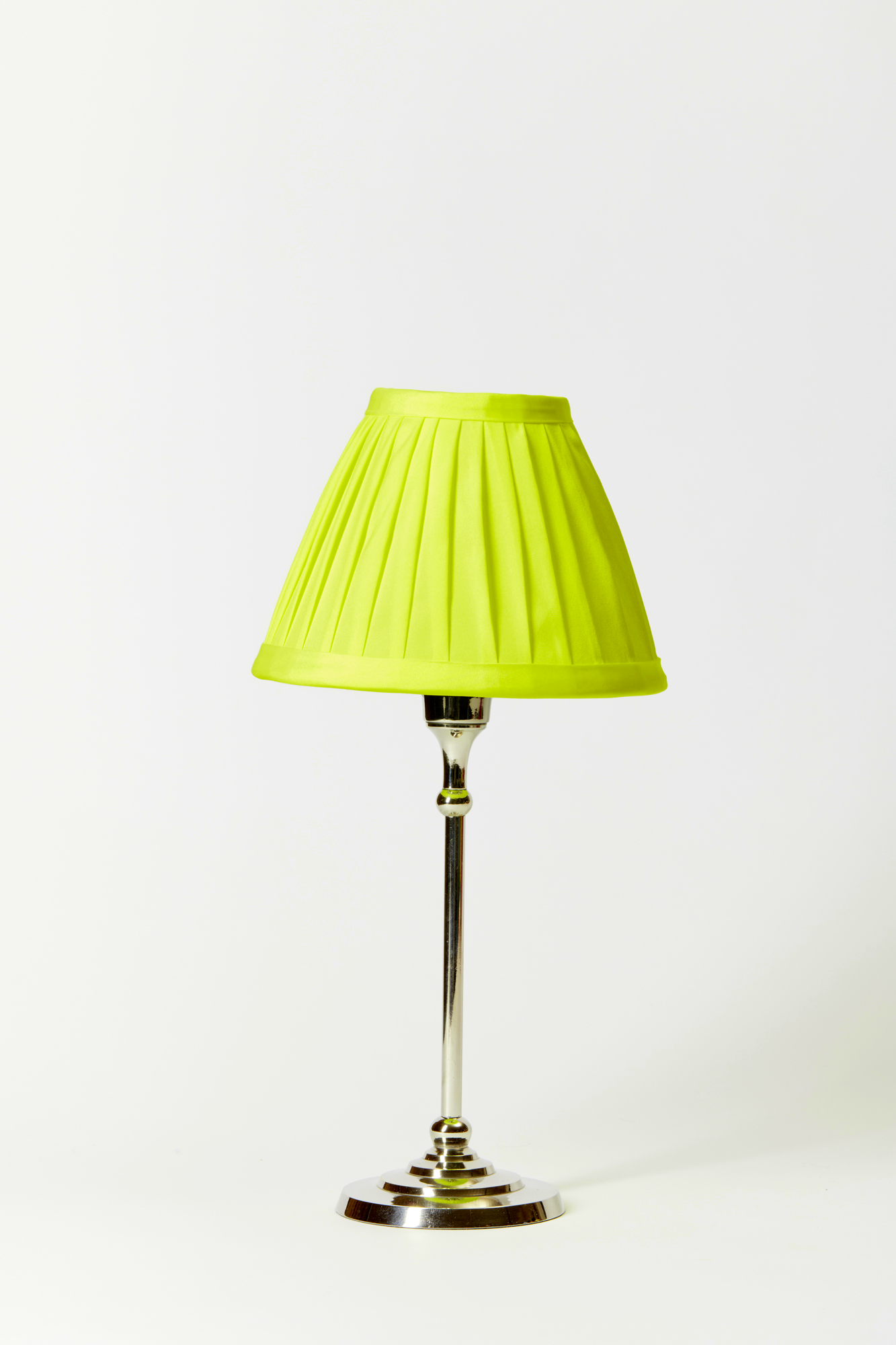 Neon yellow table lamp shade.