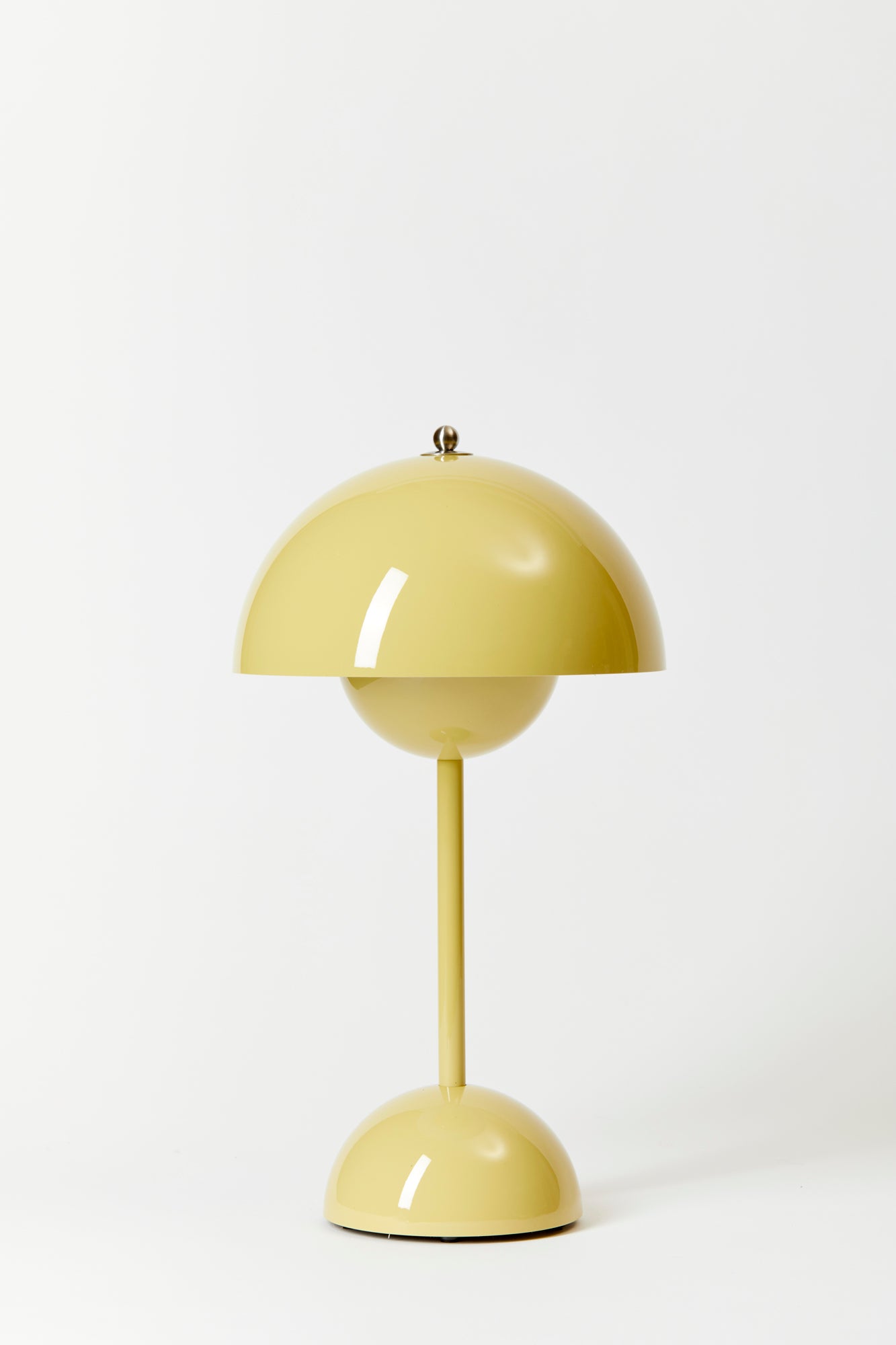 Danish designer Verner Panton’s 1968 mod design made portable lamp base in Sand.