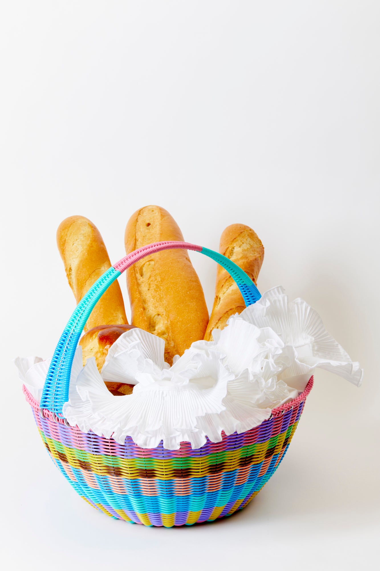 This colorful handwoven plastic Easter Basket is generously sized to fit all the spoils of the season, from Easter to Labor Day.