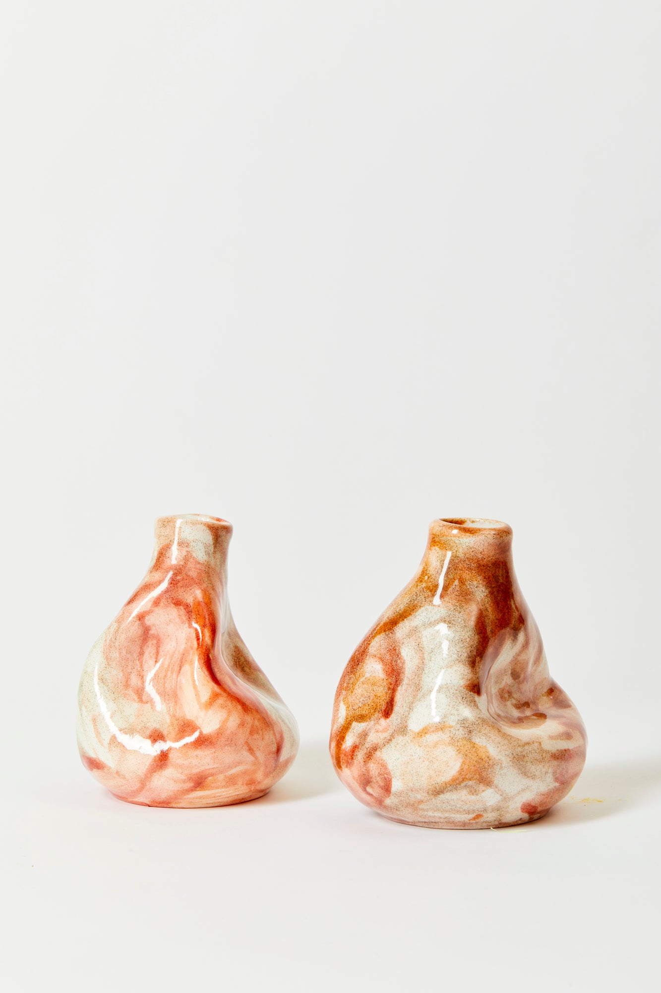 Ceramic bud vase and candlestick holder.