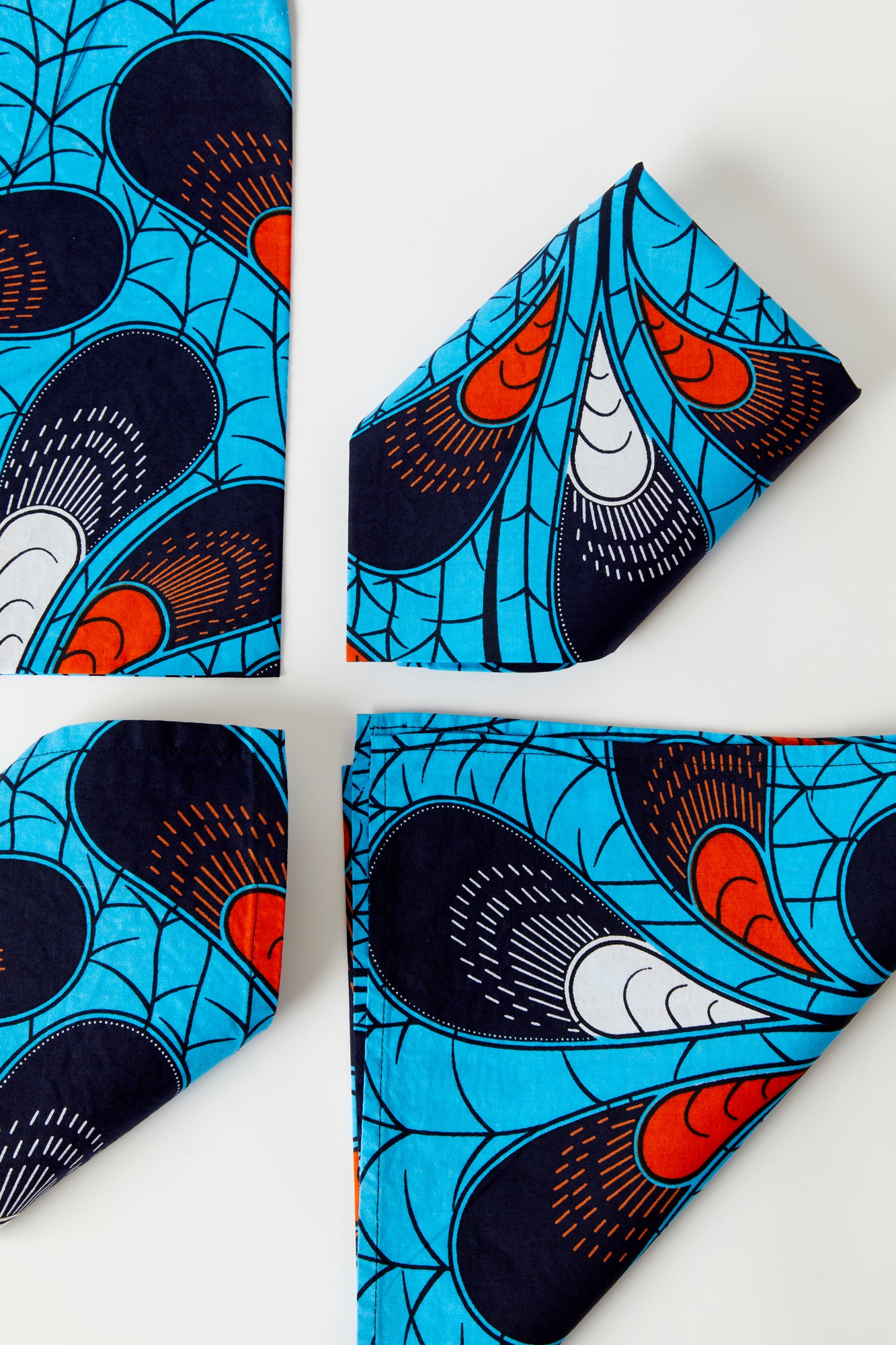These blue table linens were made exclusively for Houses & Parties by Ankara Company located in Johannesburg, South Africa.