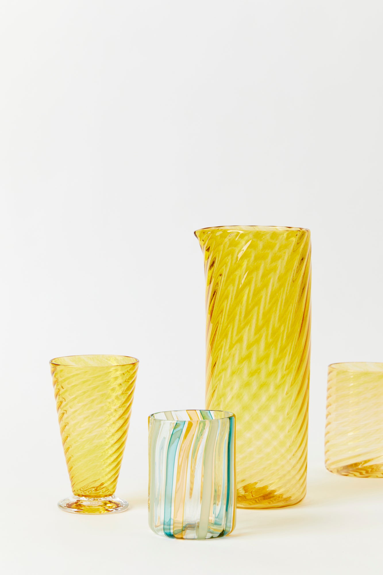 Gold twist glass pitcher by Tracy Glover.