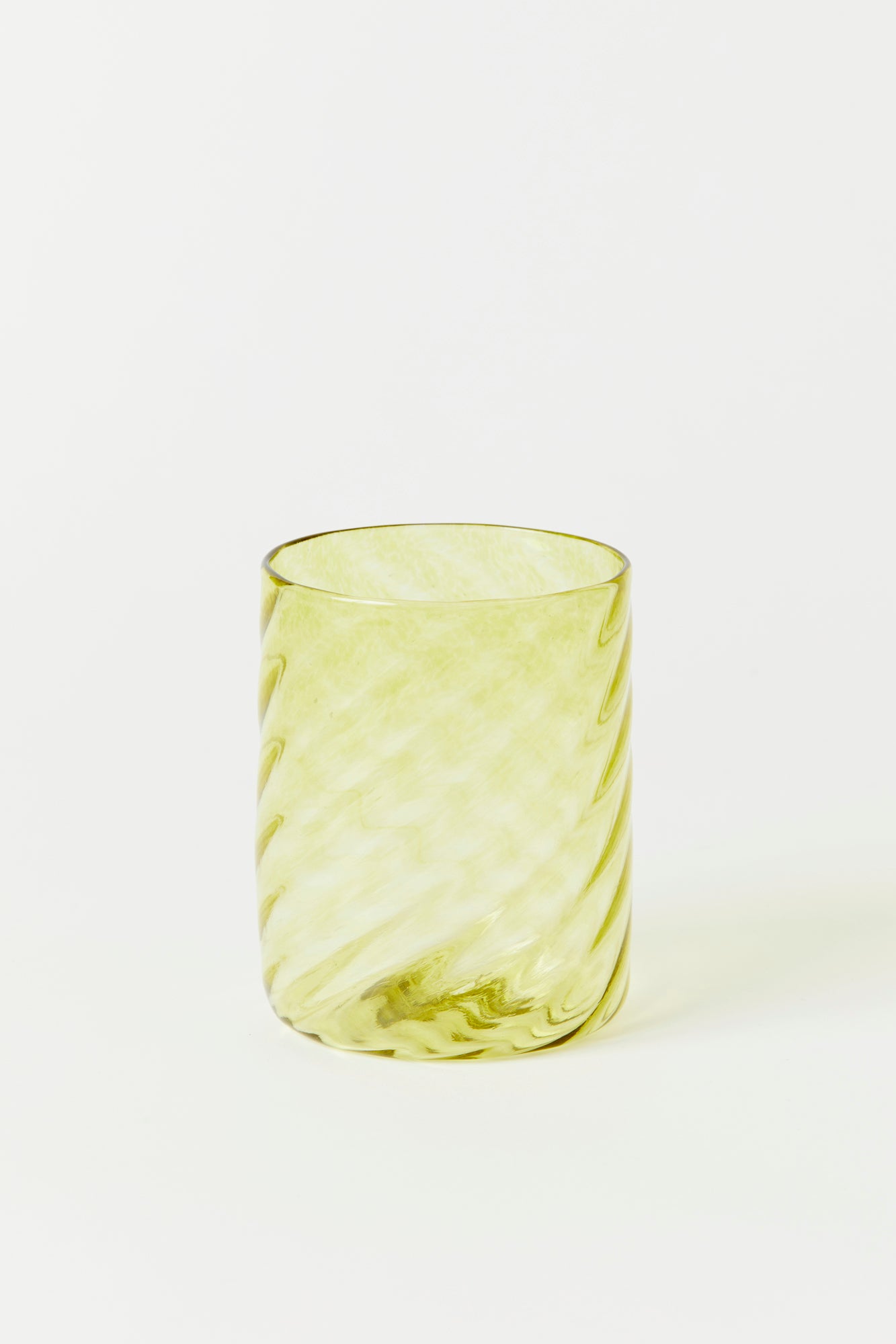Chartreuse twisted glass tumbler handblown by Tracy Glover.