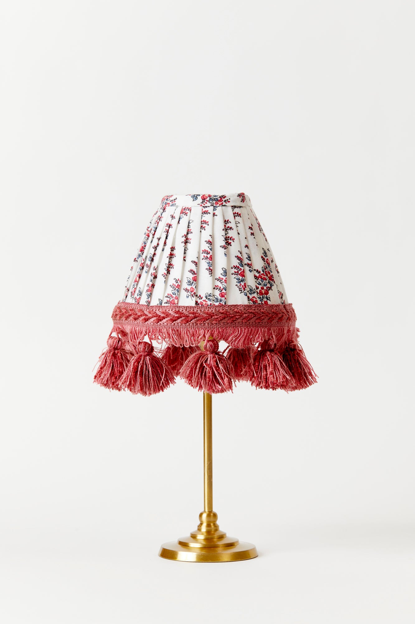 Marvelous hand-pleated shade in a Robert Kime French cotton floral with tassels.