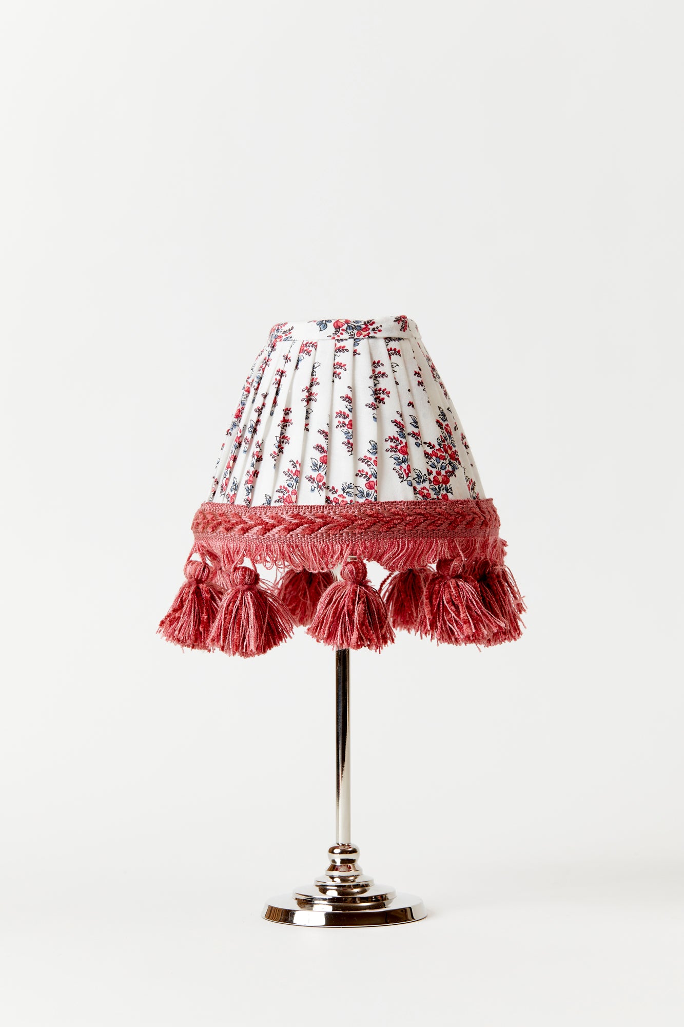 Marvelous hand-pleated shade in a Robert Kime French cotton floral with tassels.