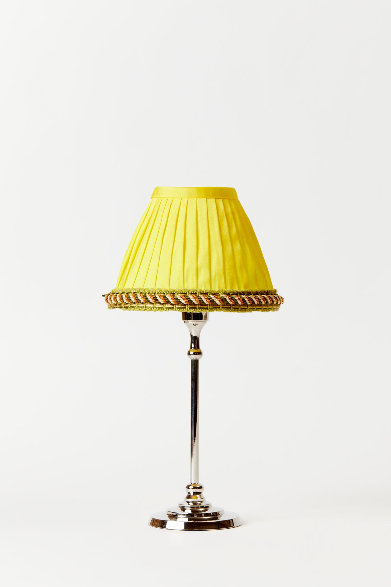 Marvelous hand-pleated silk shade in buttercup with rope.
