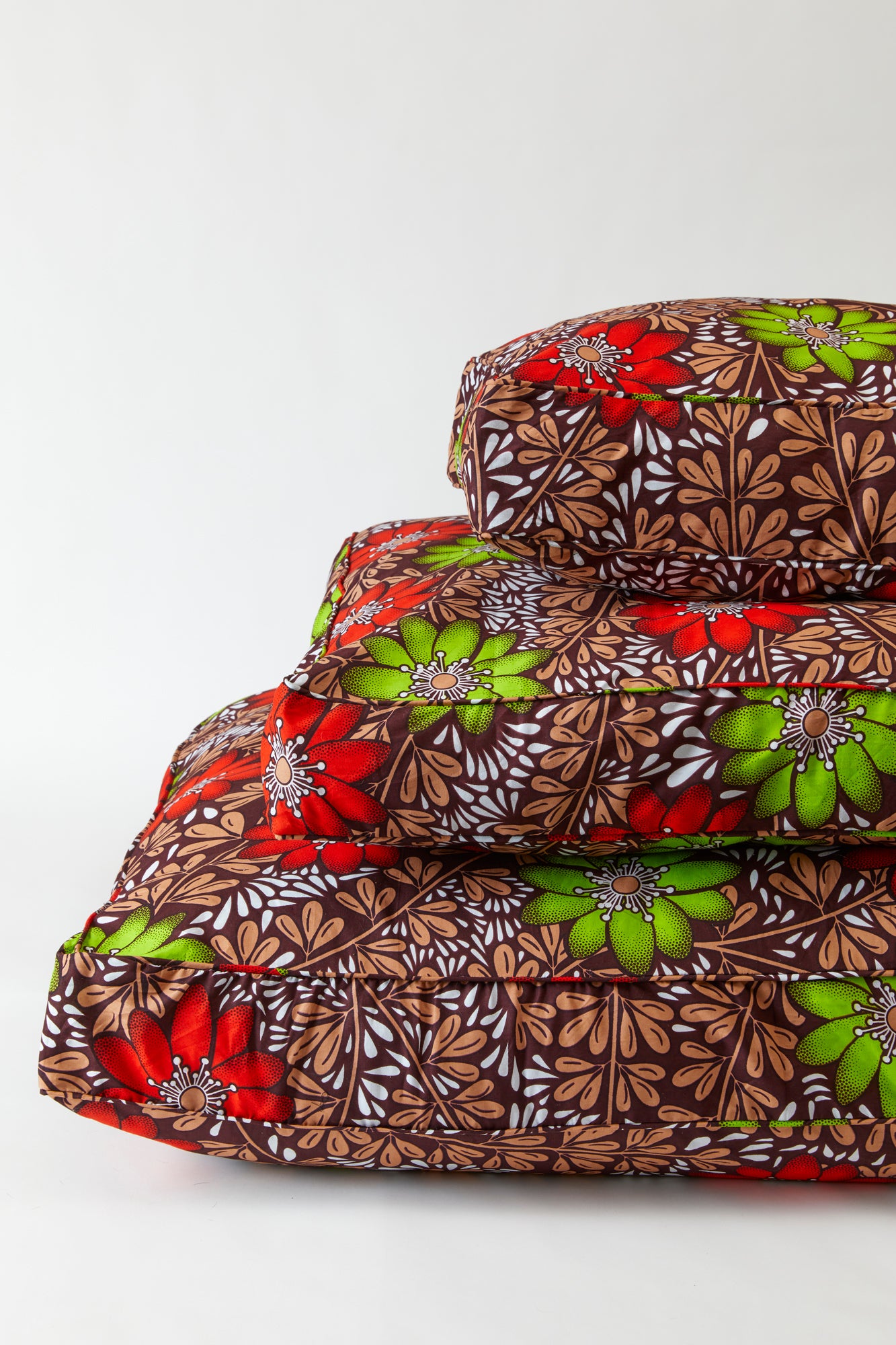 Floor cushions. The designs are inspired by over 100 years of African wax print tradition with a twist to incorporate modern South African aesthetics.