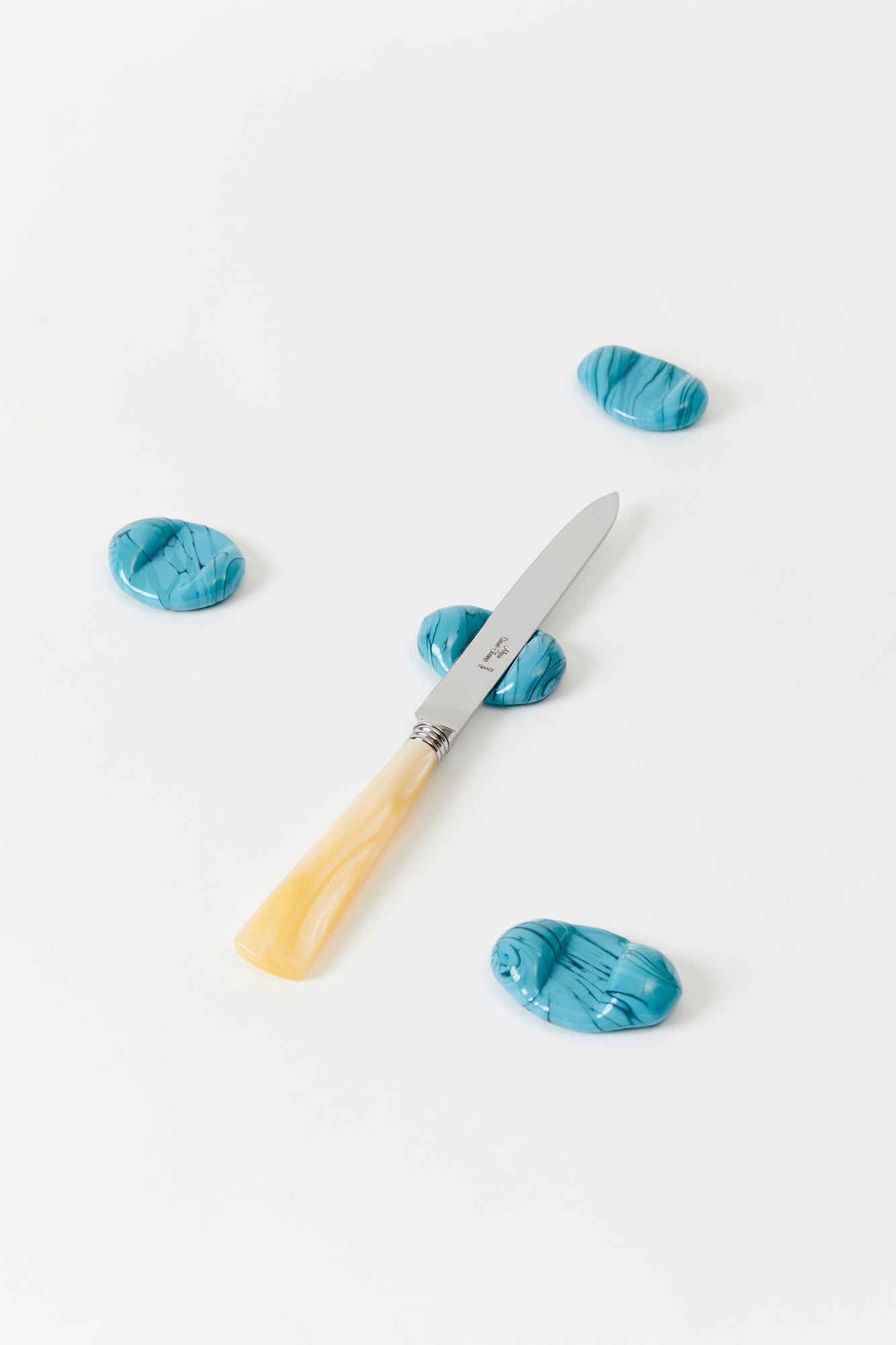 Set of four speckled glass knife rests, hand-blown.