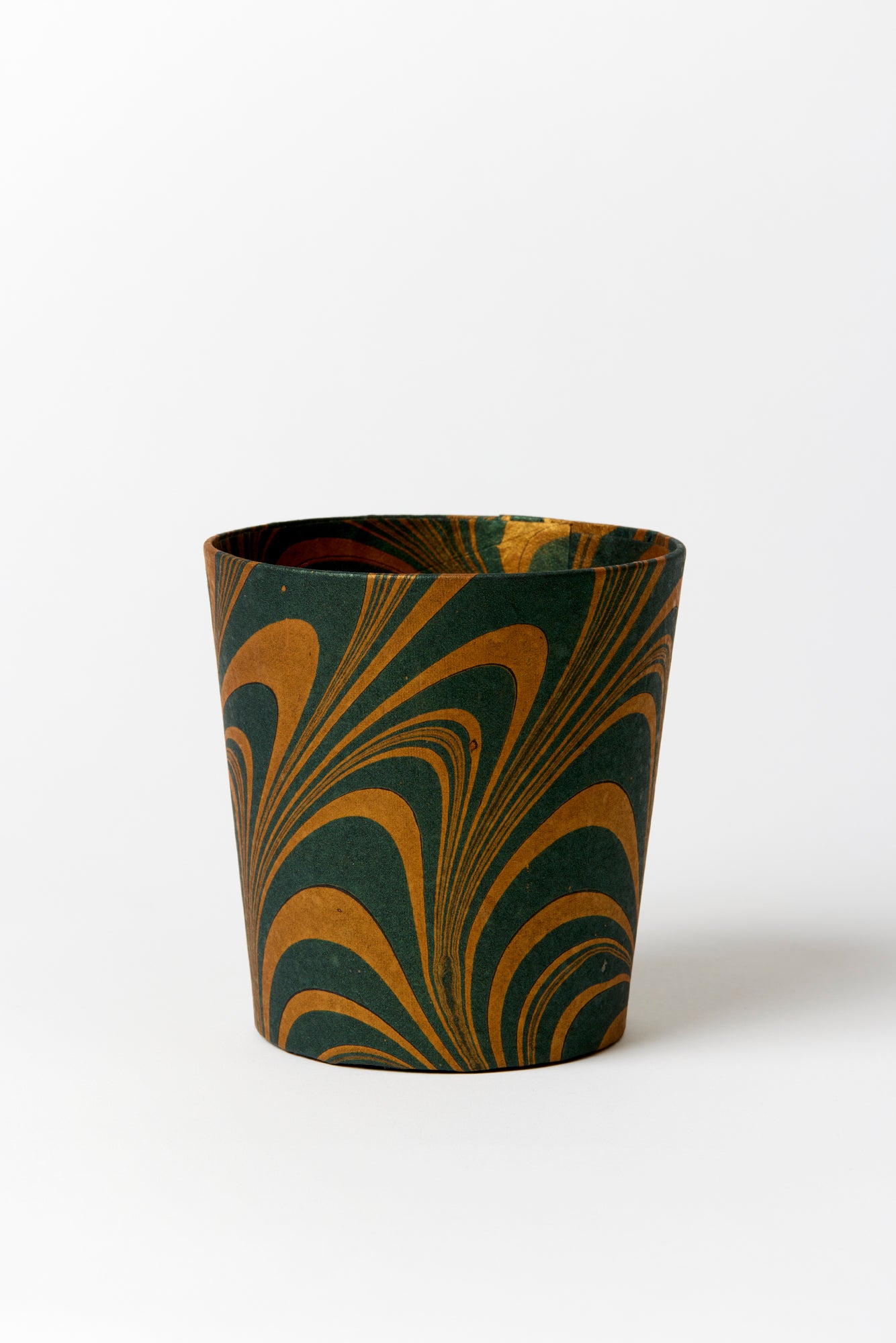 Artisan paper-covered cachepots with a plastic liner. Made to fit pots of standard seasonal bulbs or orchids.