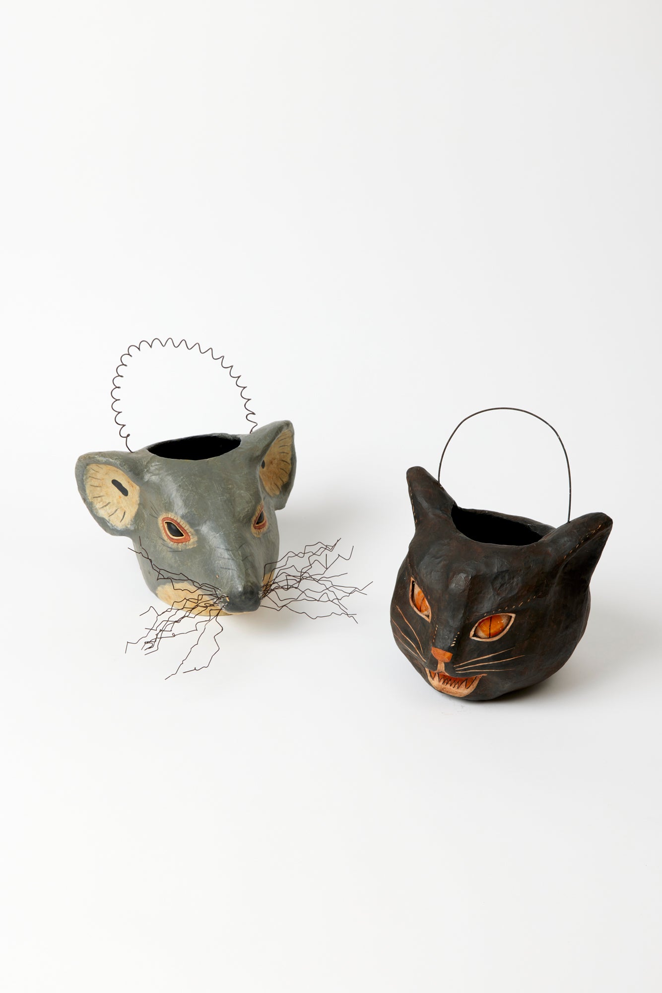 Two vintage-style candy buckets featuring classic cat and mouse designs, perfect for Halloween or festive gatherings. One bucket shows a black cat, while the other features a cute frazzled mouse, both adorned with spooky colors and artisan patterns.