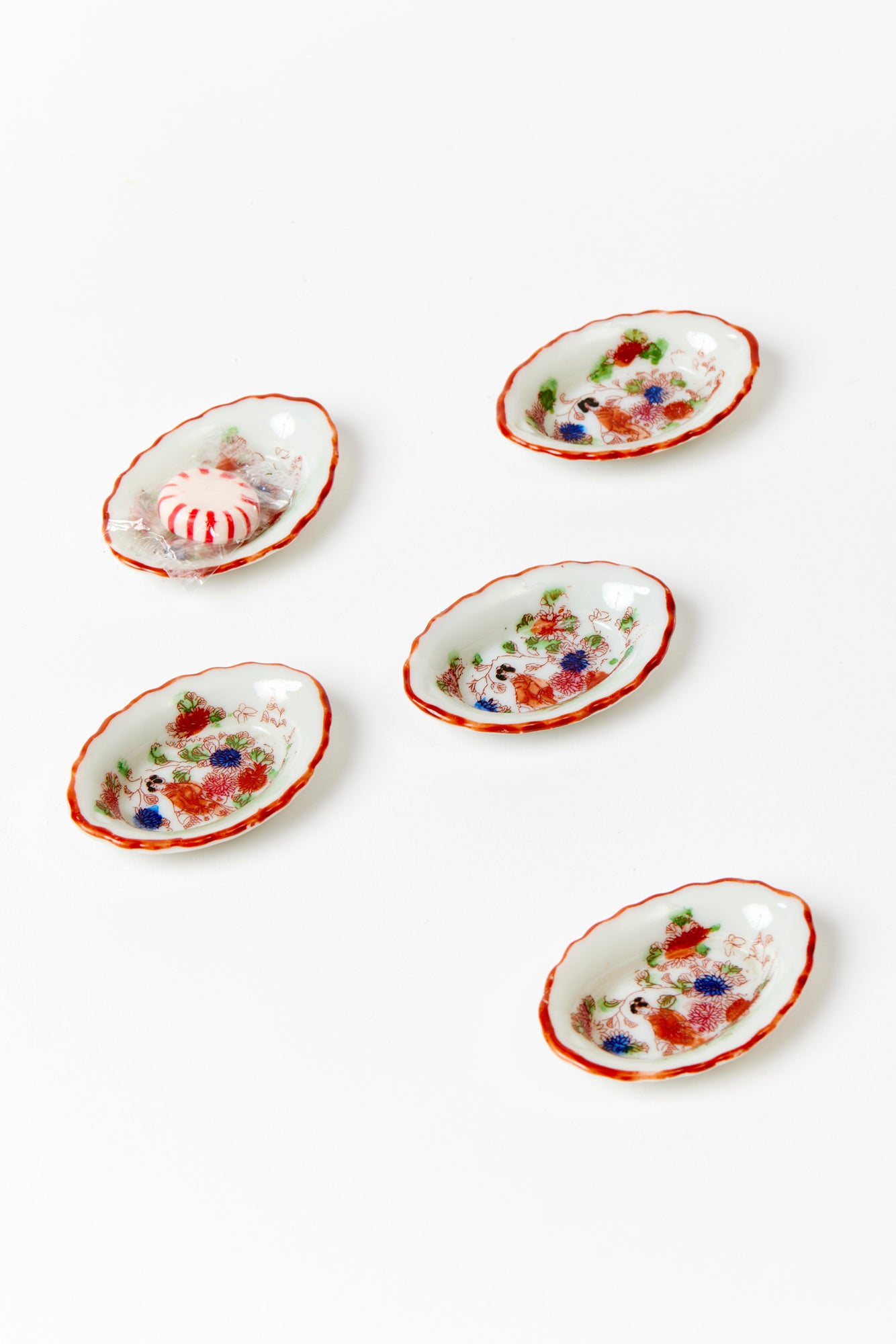 Vintage Geisha butter pats.