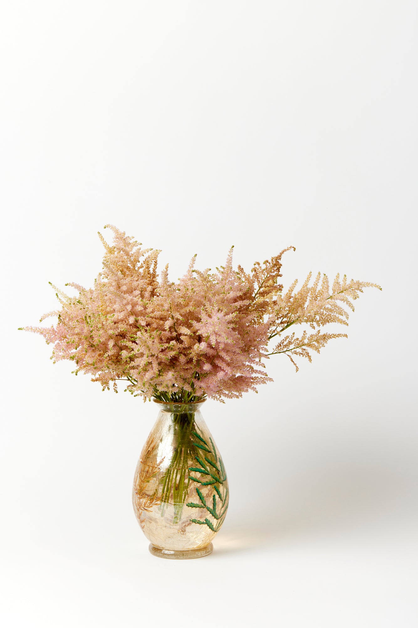 Vintage vase with gold iridizing, a craquelle finish, and hand-painted ornament.
