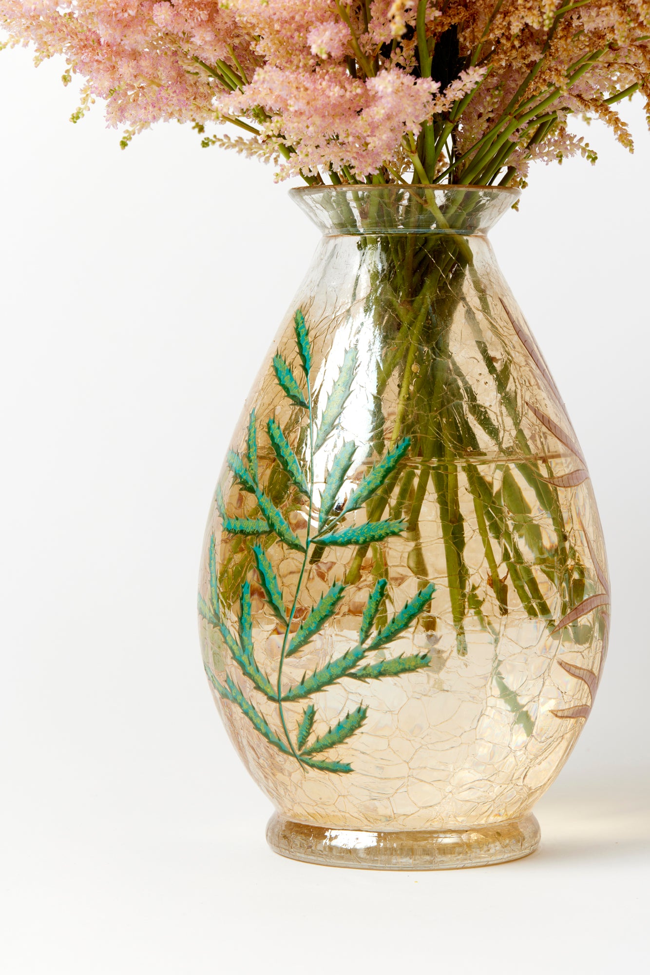 Vintage vase with gold iridizing, a craquelle finish, and hand-painted ornament.