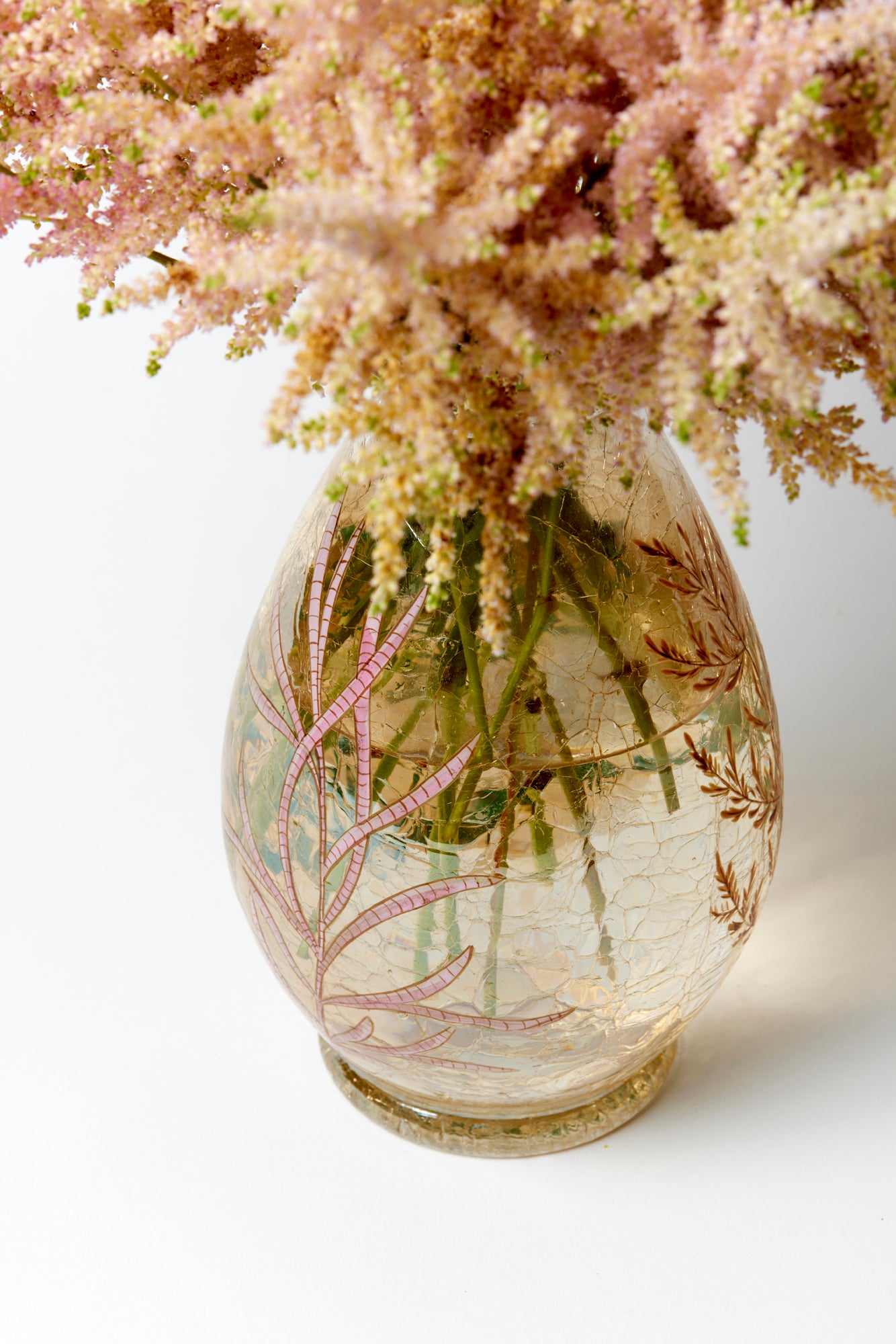 Vintage vase with gold iridizing, a craquelle finish, and hand-painted ornament.