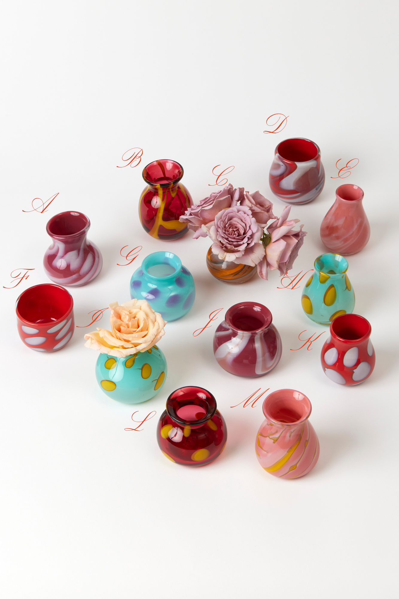 Handblown glass swirled bud vases. Made by Paul Arnhold.