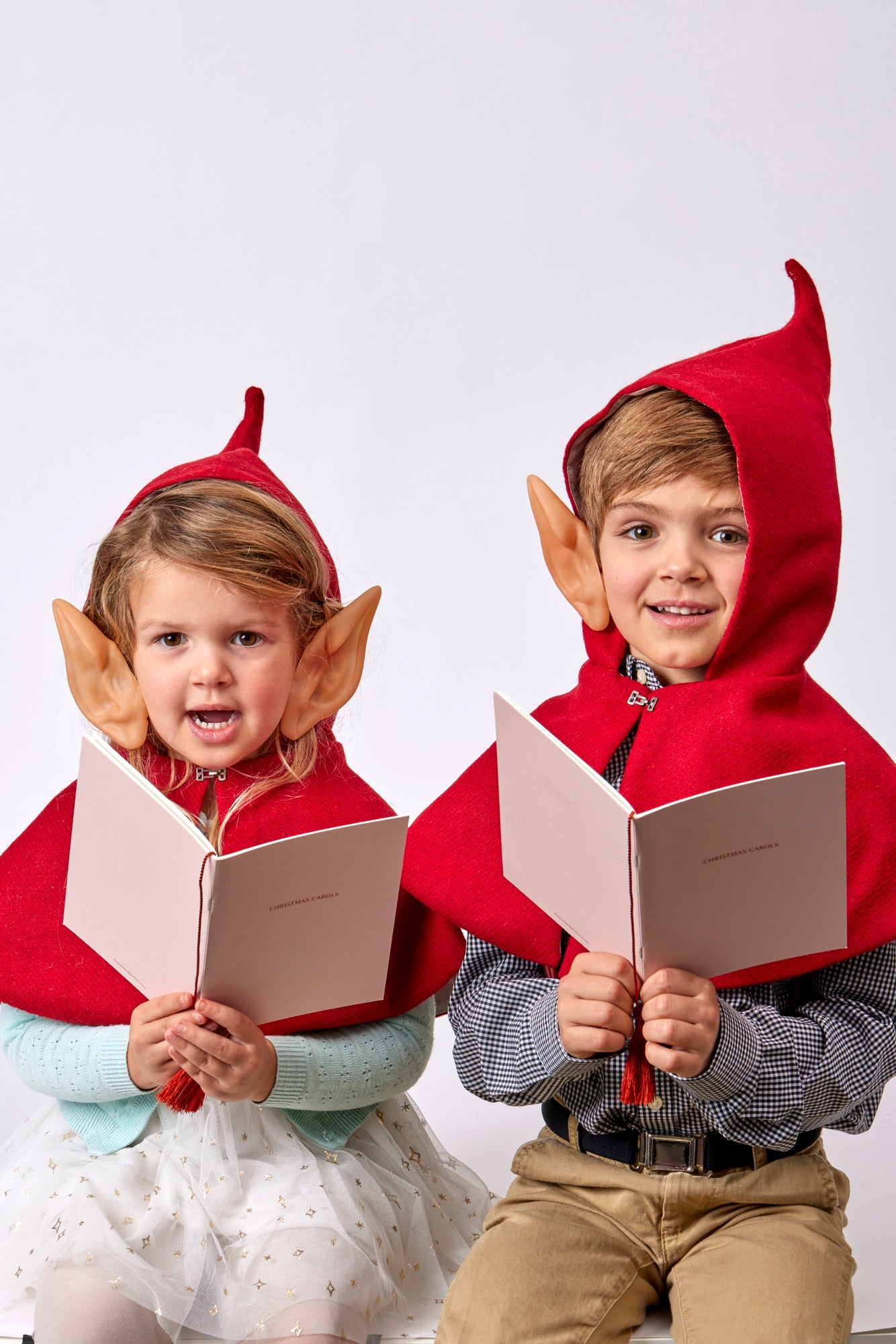 SET OF 4 CAROLING SONGBOOKS