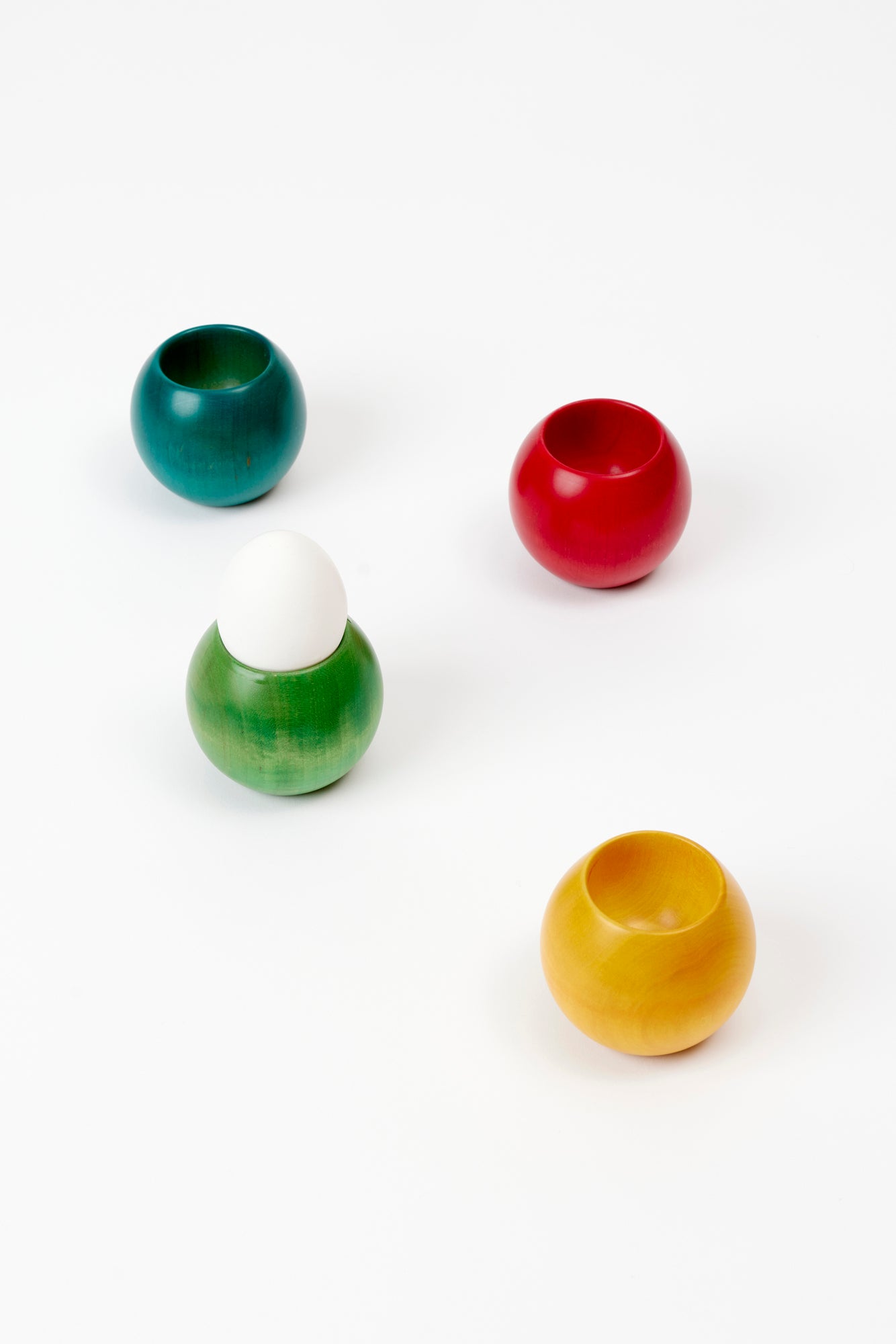 Colorful wood egg cups.