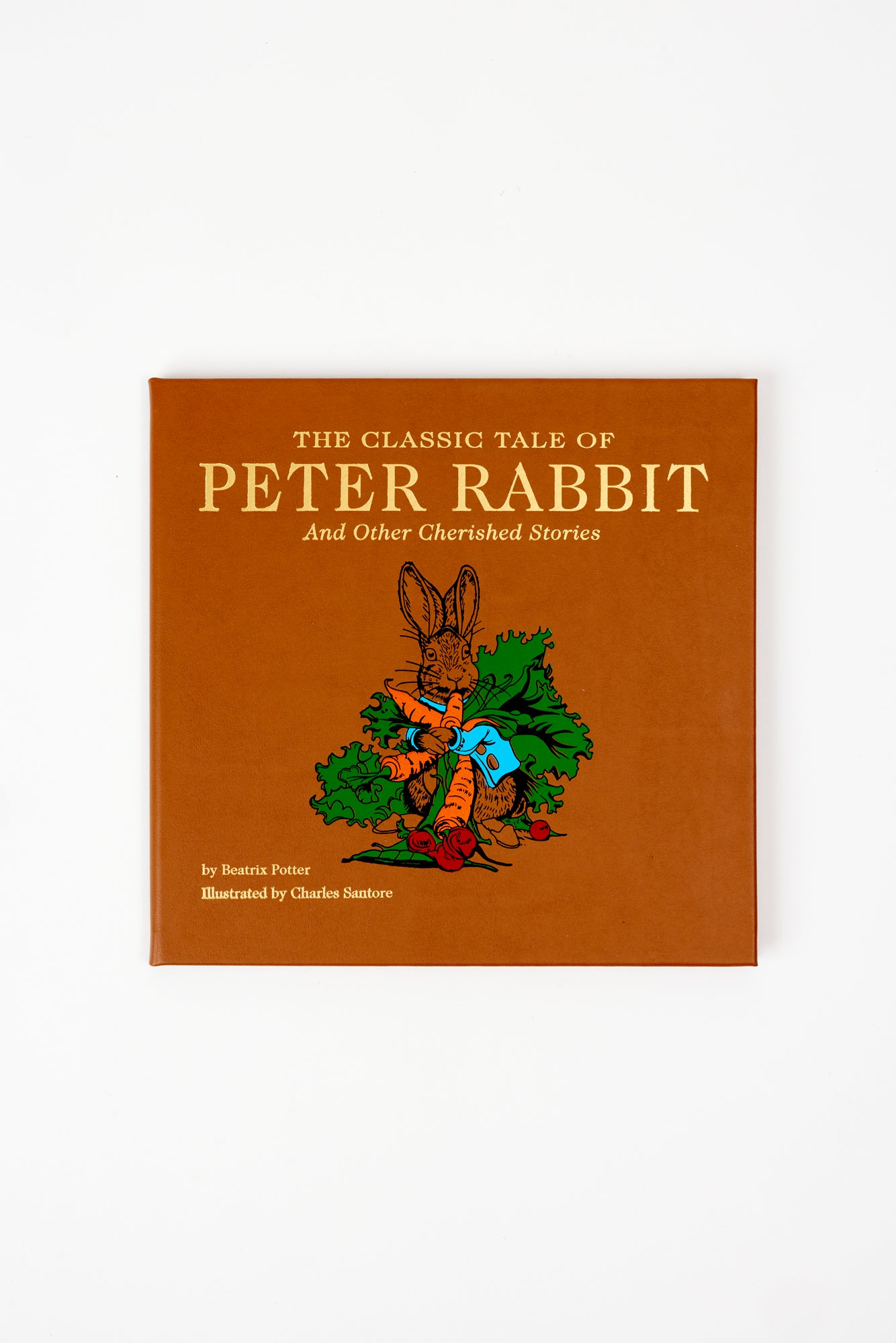 The Classic Tale of Peter Rabbit  is celebrated in this hand-bound leather classic edition. 