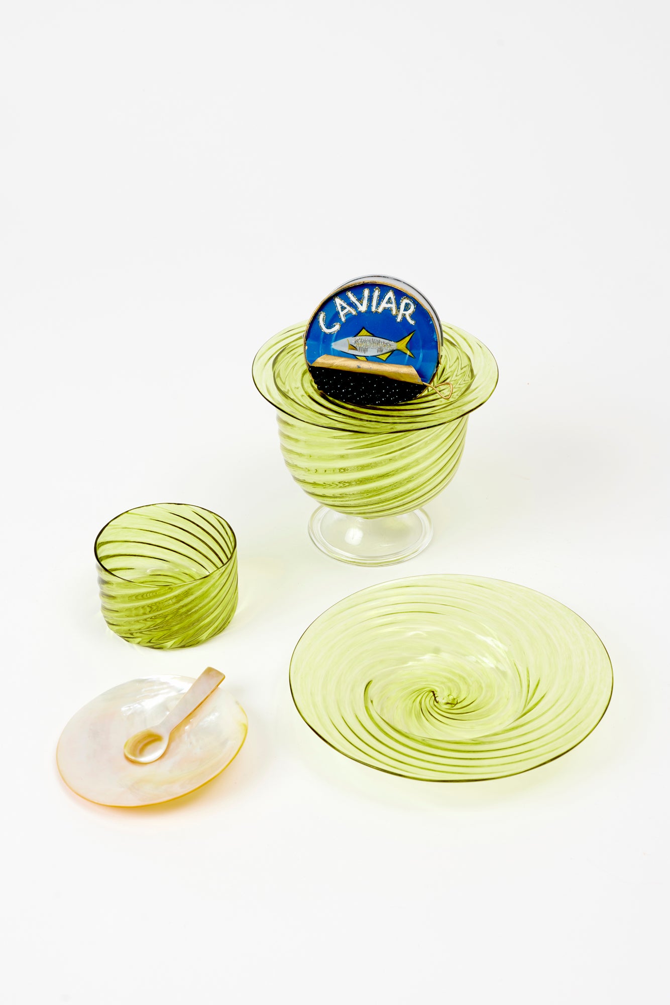 Artisanal twisted glass caviar service in Chartreuse, handblown by Tracy Glover in her Rhode Island studio.