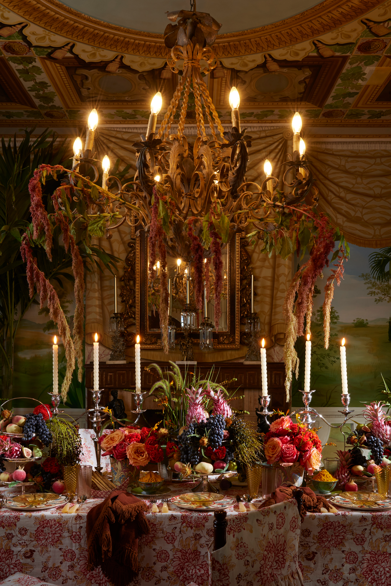 Spicy red and pink floral tablecloth to the floor.