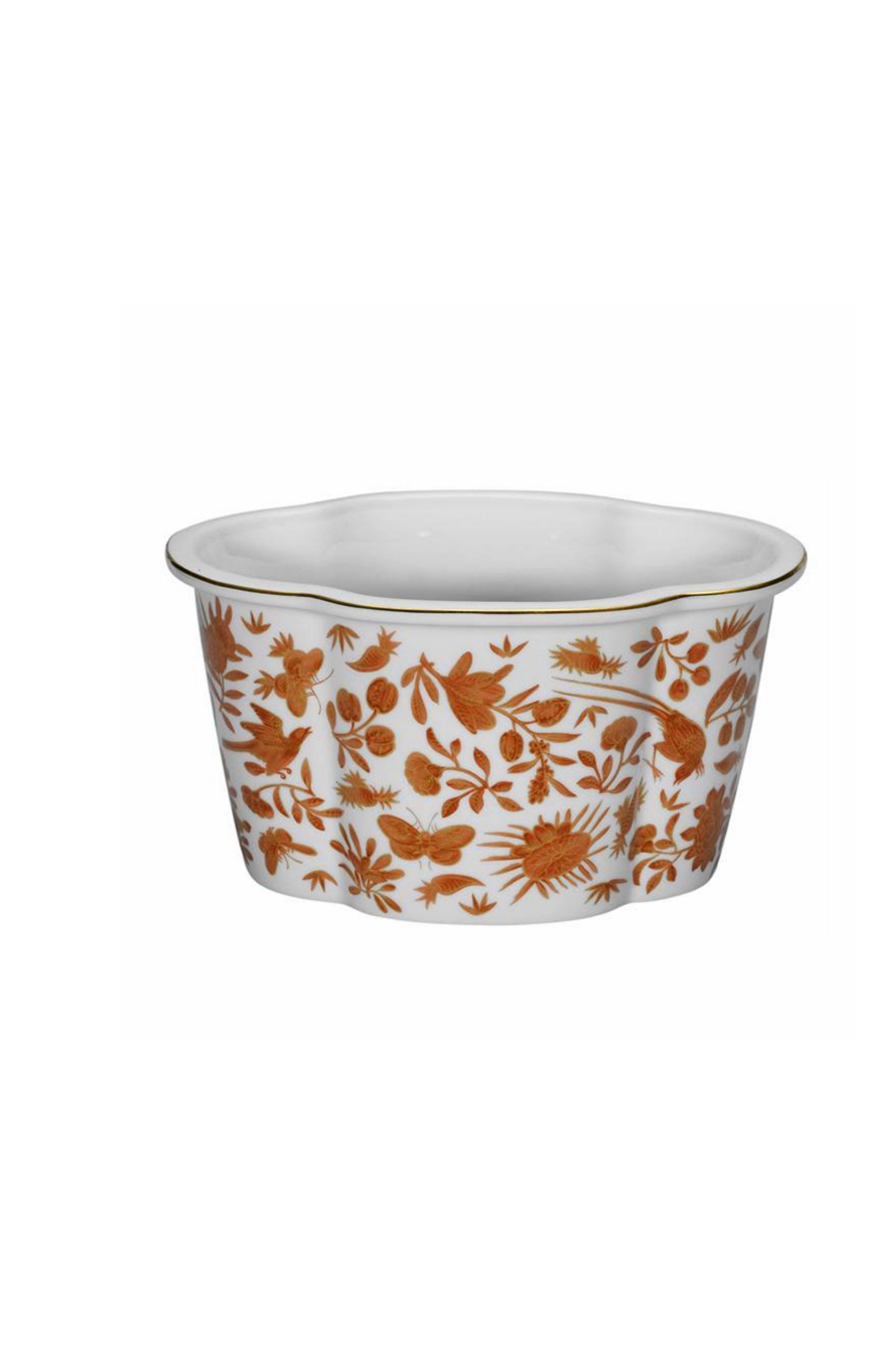 Sacred birds in orange print. Five piece place setting includes dinner plate, dessert plate, bread & butter plate and teacup with saucer.