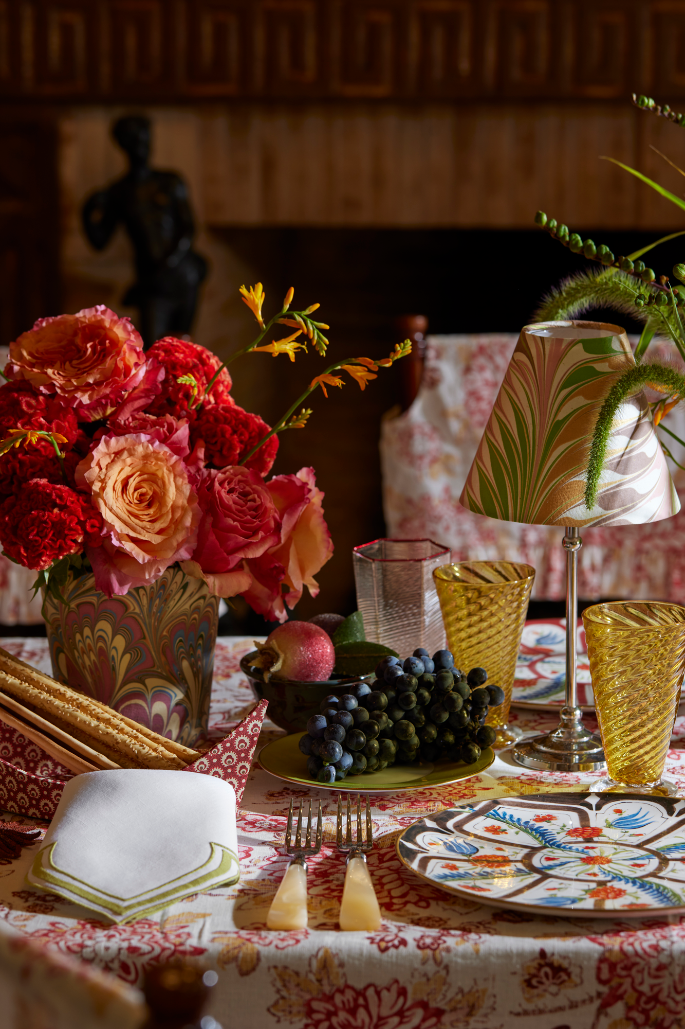 Linen dinner napkin in an unusual scalloped design with chartreuse embroidery and French stitch appliqué made in Madeira, Portugal.